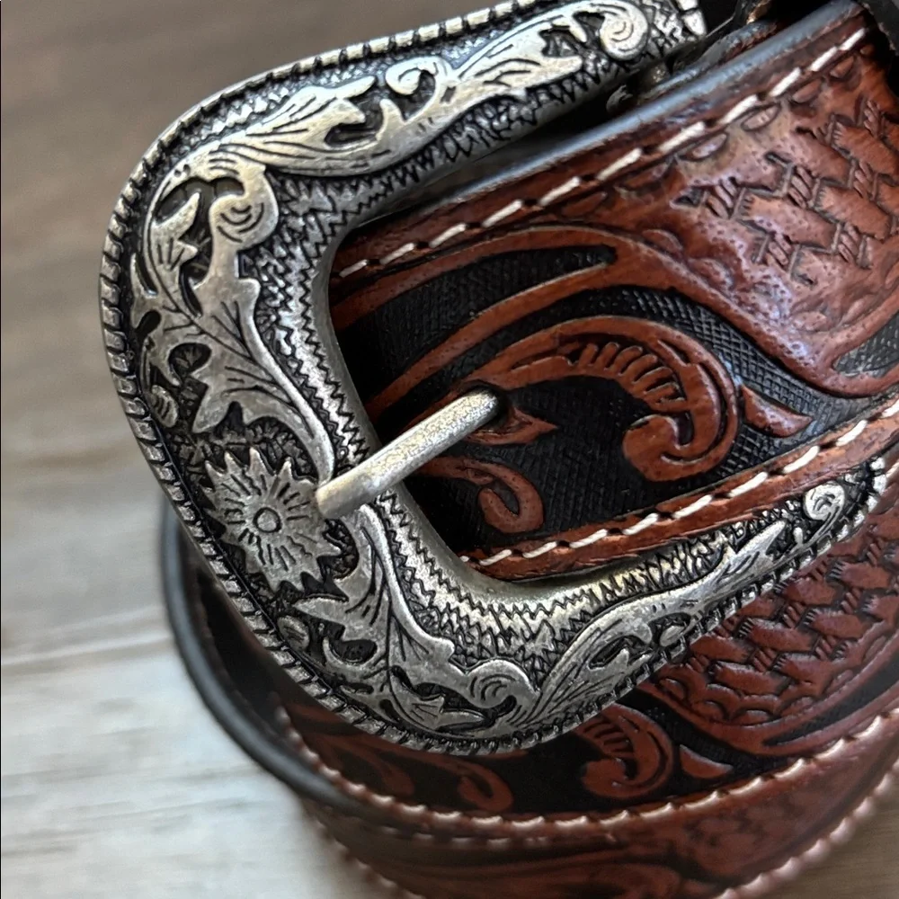 Ridge Mountain Genuine tooled leather,single stitch, silvertone embossed buckle